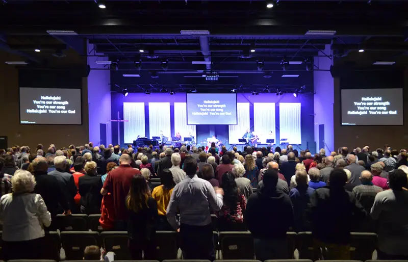 Photo of people worshipping in Whyte Ridge Baptist Church's sanctuary